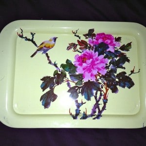 a retro metal tray with birds and flowers