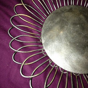 silver flower tray on a purple background