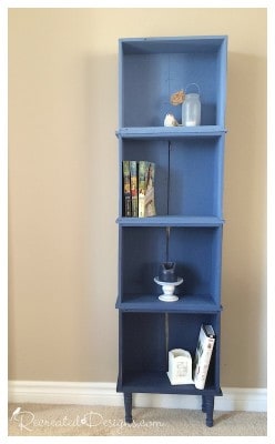 A bookshelf created out of old dresser drawers. Painted and distressed.