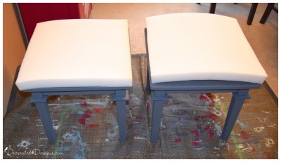 two piece of foam cut to fit the top of two painted side tables