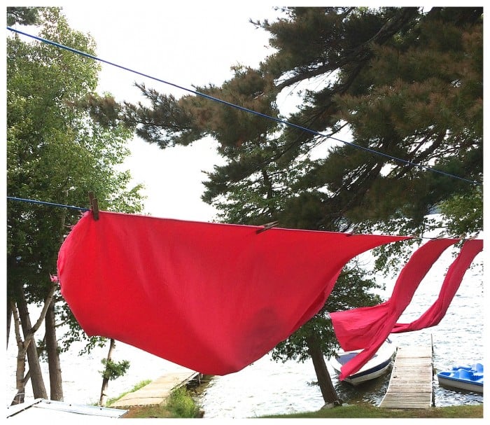 drying dyed fabric on a clothesline