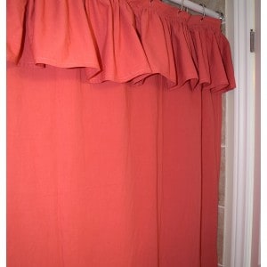 a coral coloured DIY shower curtain