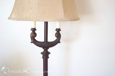 a vintage floor lamp before being recreated with paint and trim