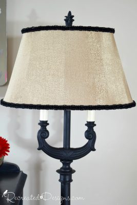 vintage lampshade with black velvet ribbon added to it