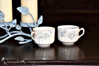 beautiful blue and white tea cups with candles