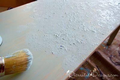 applying Saltwash mixed with Miss Mustard Seed Milk Paint to a coffee table