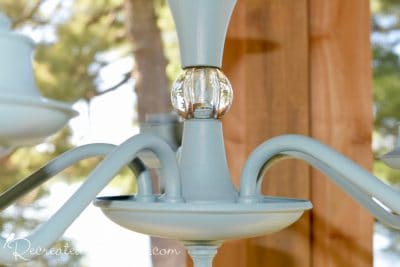 the glass marble adorning an old chandelier