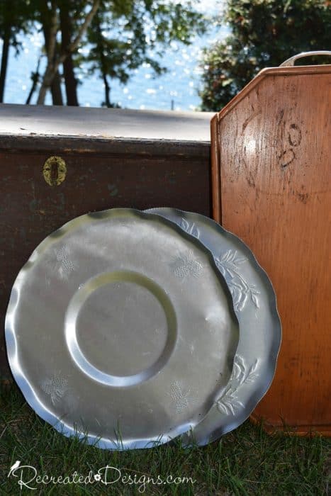 two metal trays and a wood tray found at a reuse store