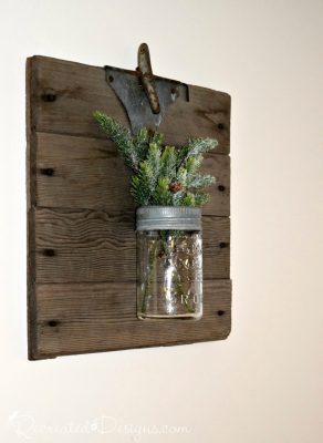antique mason jar and reclaimed wood filled with greenery