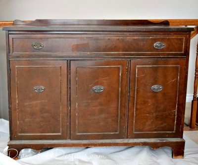 old antique buffet in bad shape