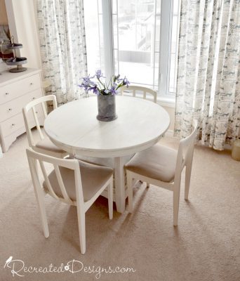 a cream and natural coloured dining room