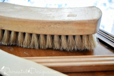 old wood handled brush with natural bristles