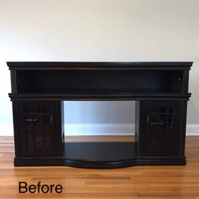 black media console before being transformed with paint