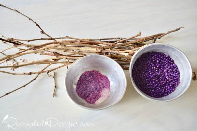 twigs, purple glitter and purple beads