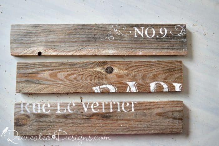 adding stencilling to reclaimed pallet wood