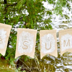 a reversible bunting for summer and fall using vintage wallpaper and burlap