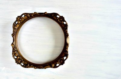 old round ornate gold frame