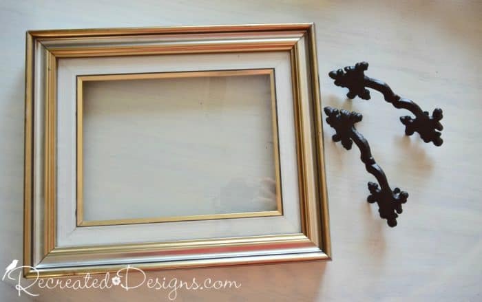 reclaimed frame and wrought iron handles