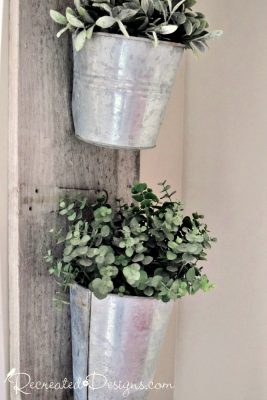 galvanized buckets on reclaimed wood