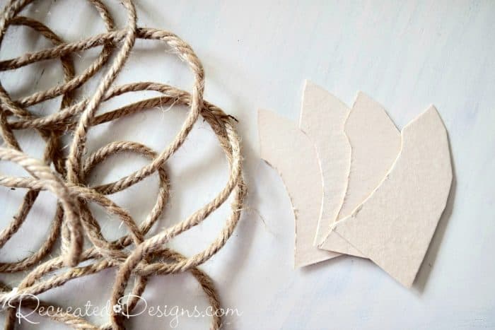 making a pumpkin stem with cardboard and jute rote