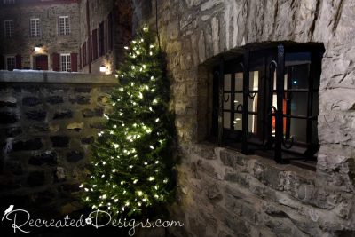 Christmas tree and stone buildings in Old Quebec City, Canada