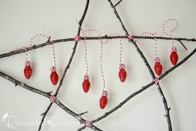 reclaimed vintage bulbs hung from a Scandinavian inspired twig star