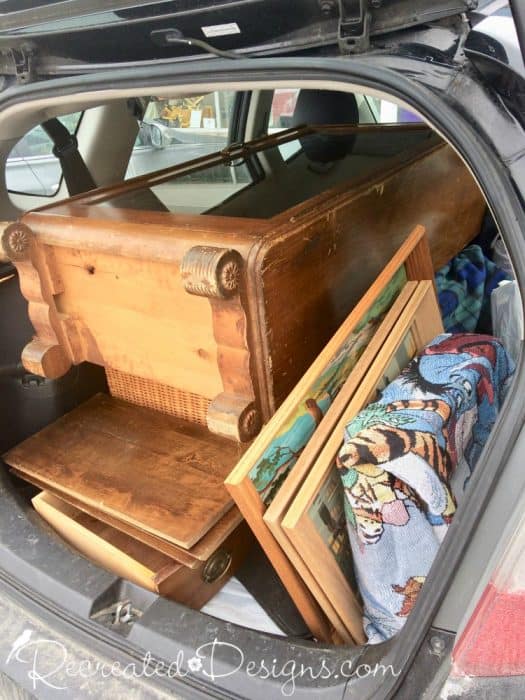 vintage finds piled in the back of a Honda