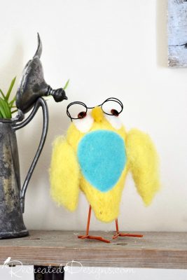 Cute yellow bird wearing glasses