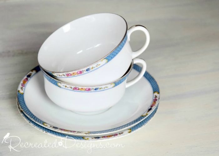vintage fine china with pink flowers and blue trim