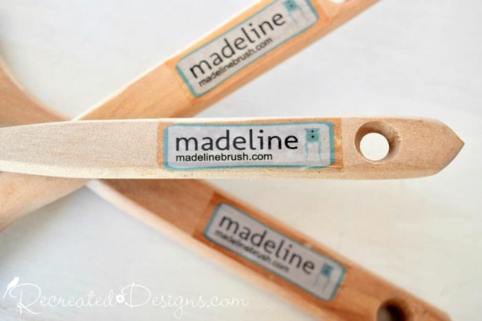 Madeline paint brush handles and logo
