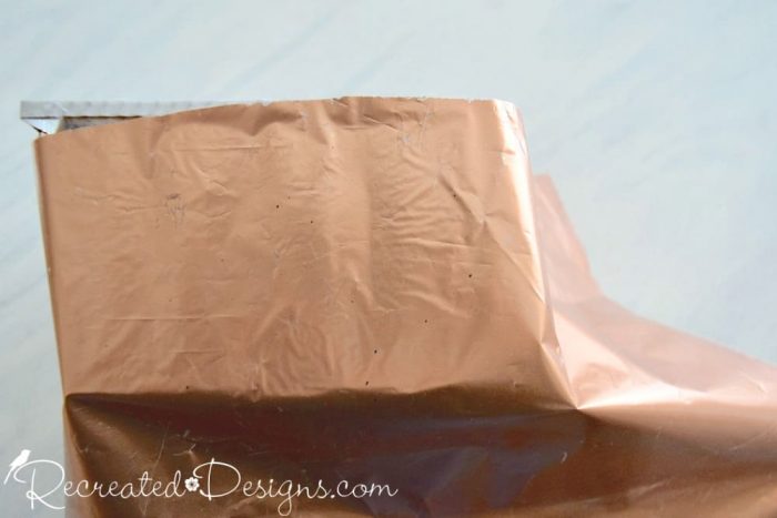 adding copper foil to an old picking basket