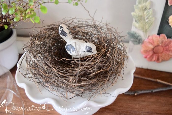 birds nest on an ironstone cake stand