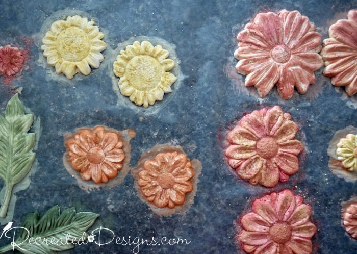 paper clay flowers drying after being painted