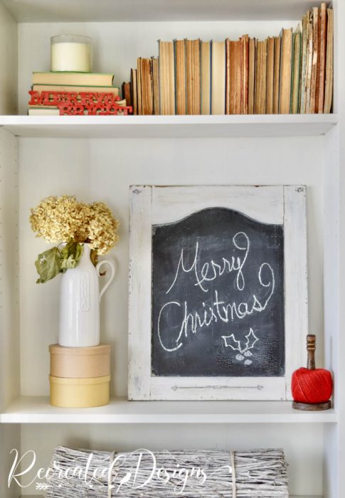 bookshelves decorated for the holidays
