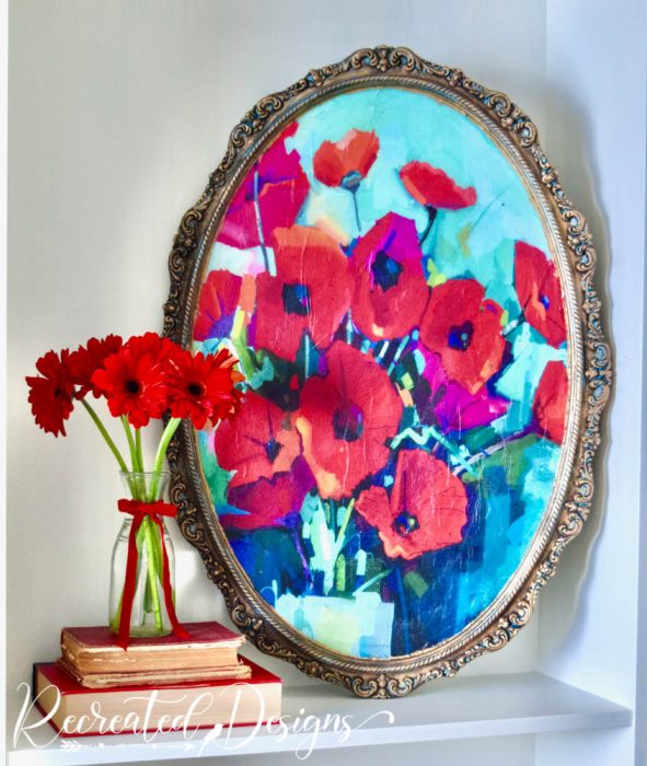 a vintage mirror turned into art