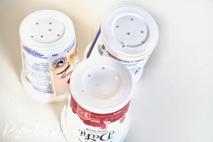 holes added to yogurt containers