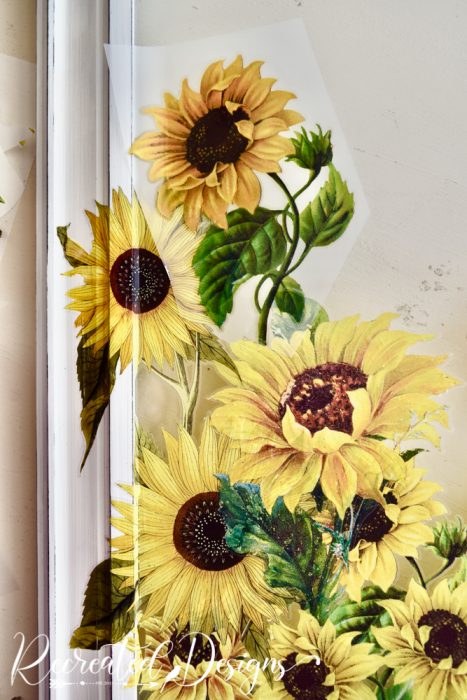 applying sunflower transfers to glass and frame