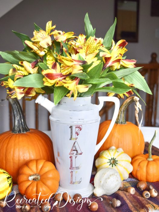 fall flower and pumpkins