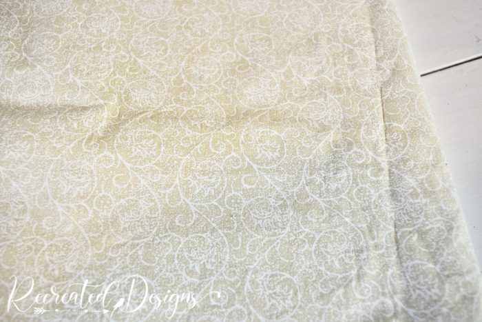 https://www.recreateddesigns.com/wp-content/uploads/2022/04/spoonflower-fabric-beige-white-swirls-light-cord-cover-Recreated-Designs-700x467.jpg