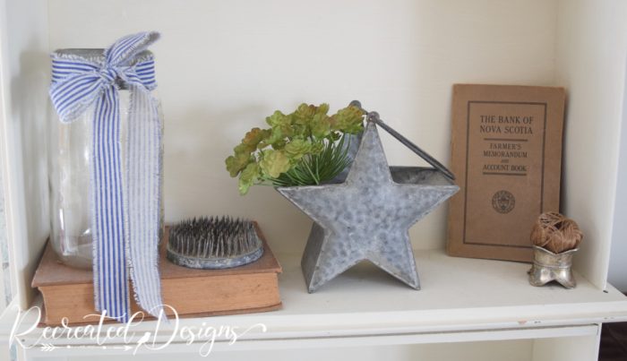 vintage decor pieces on a shelf