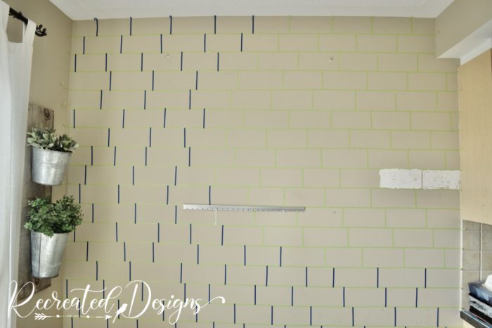 making brick outlines with thin painters tape