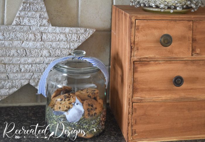 cookie jar on a counter in front of a star