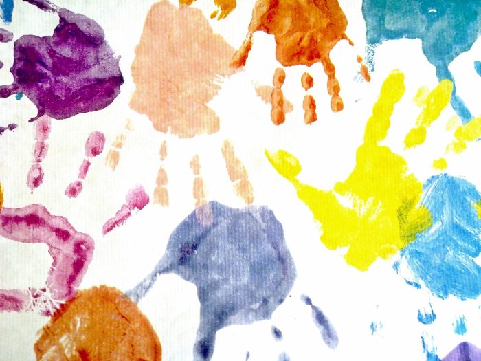 colorful handprints in paint