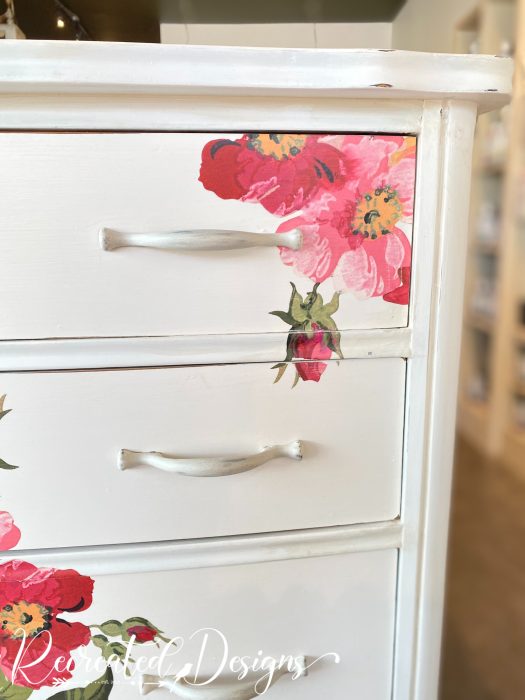 flowers on a white dresser