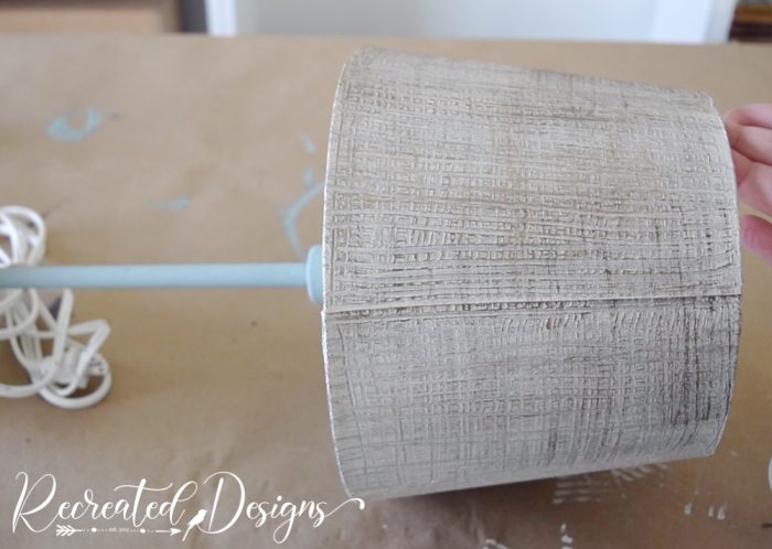 adding antiquing glaze to a lamp shade to show the texture