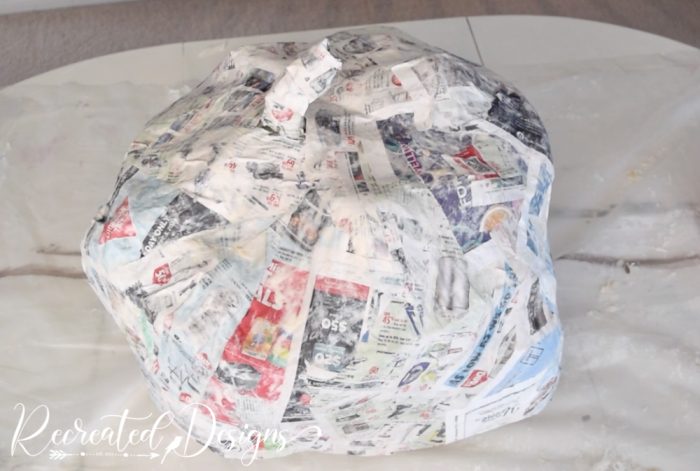 dried paper mache in the shape of a pumpkin